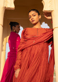 Burnt orange flared suit
