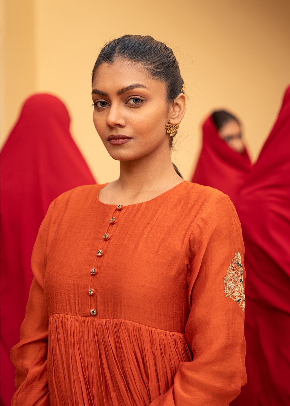 Burnt orange flared suit