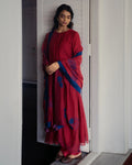 RED SUIT SET WITH BLUE EMBROIDERY.