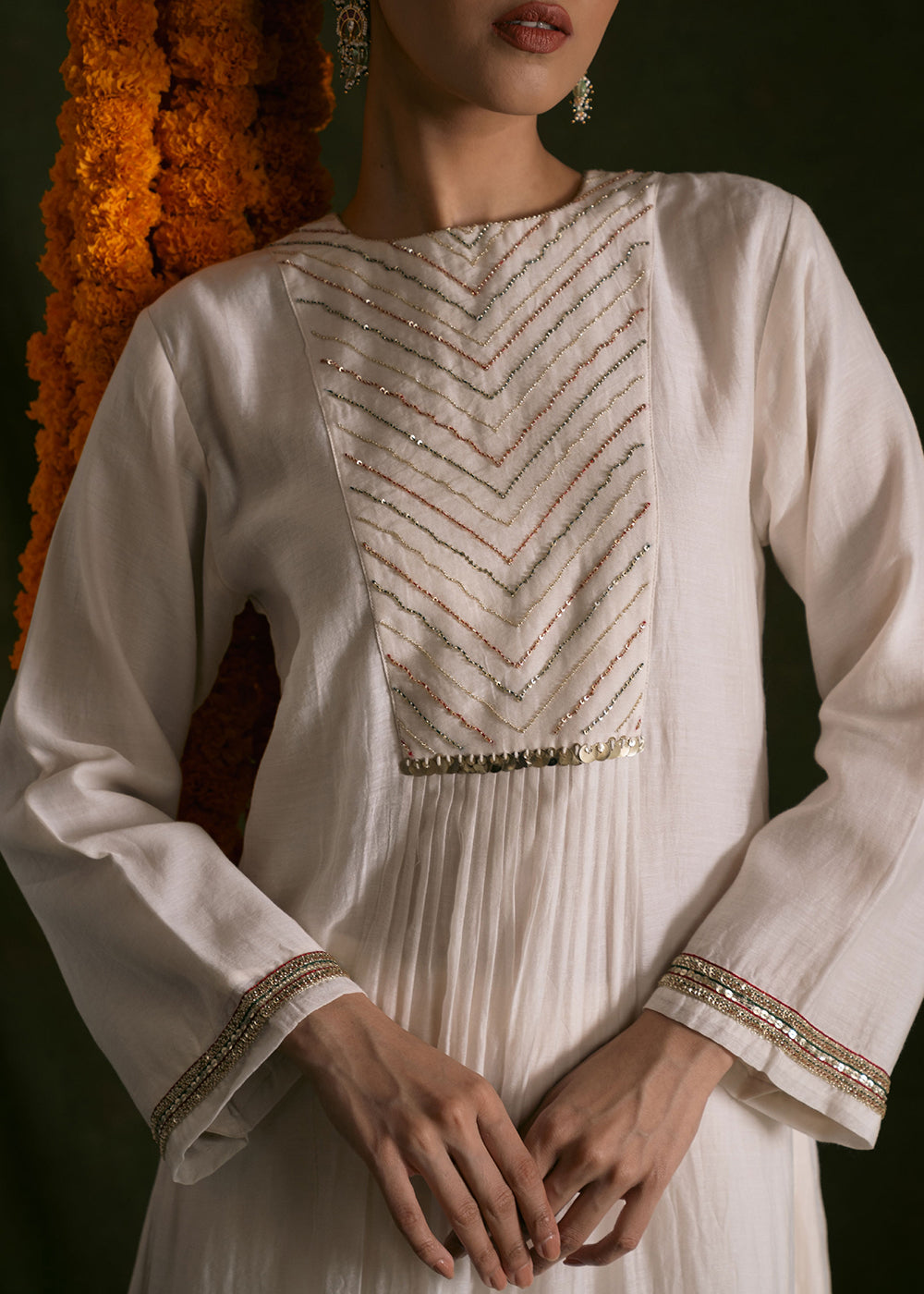 Ivory suit with yoke embroidery